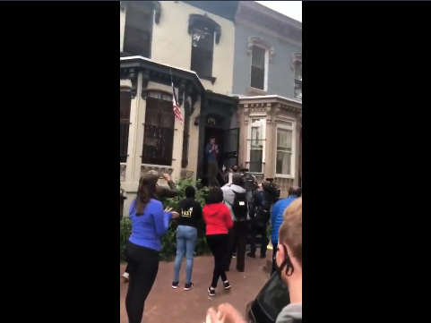 caption: Dc Homeowner Protects Protestors