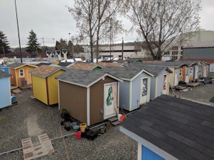 caption: Houses at the Georgetown tiny house village