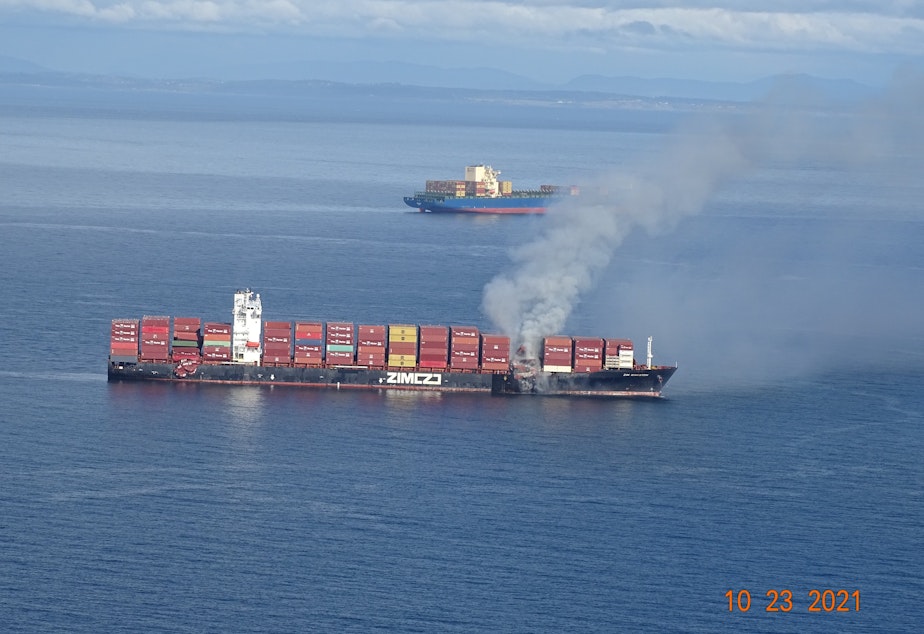 caption: The Zim Kingston on fire on Oct. 23, 2021, off Victoria, British Columbia