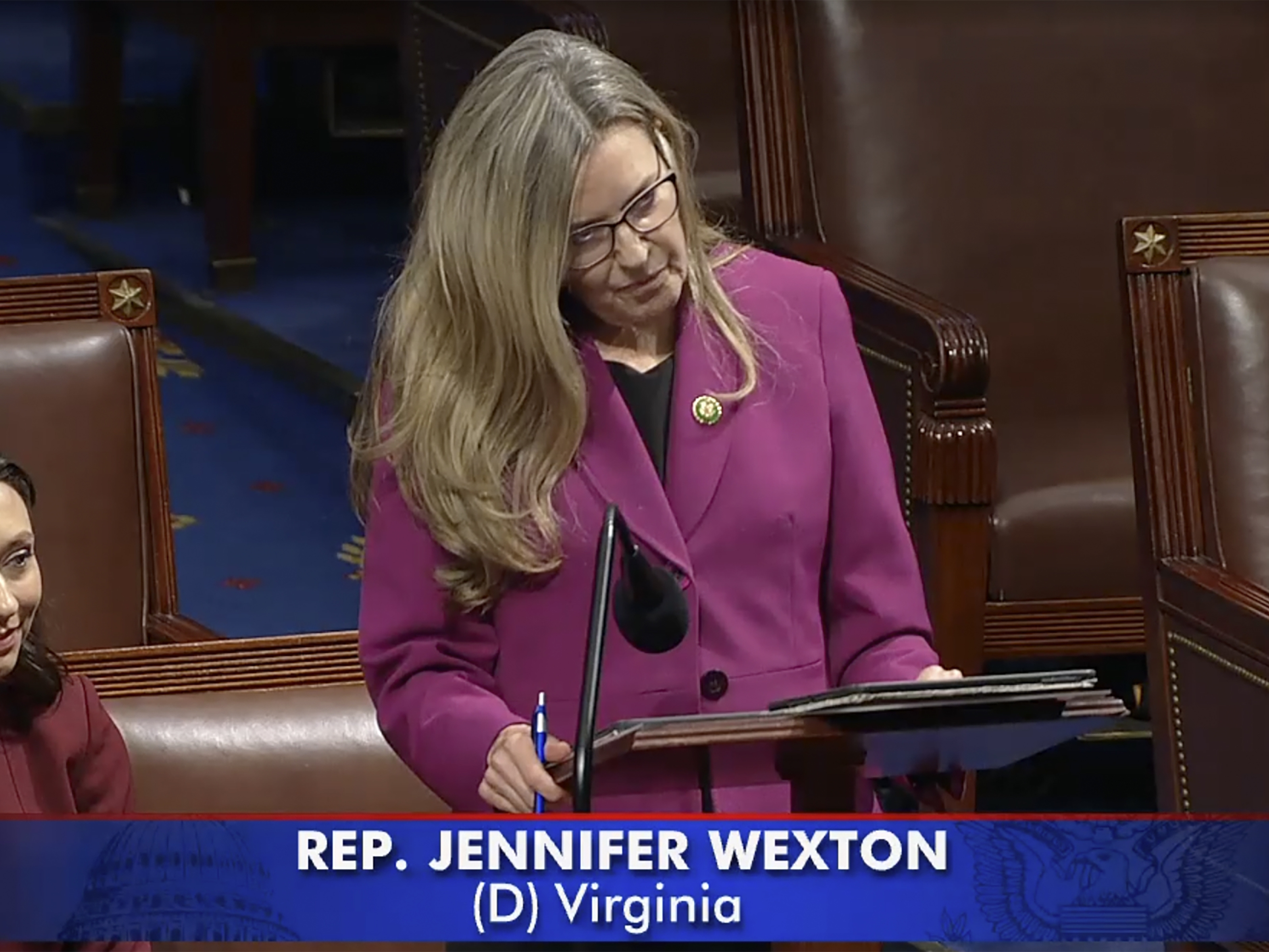 caption: Rep. Jennifer Wexton, D-Va., was diagnosed with a degenerative neurological disorder last year that has inhibited her mobility and hampered her voice. On July, 25 she debuted the use of an AI tool built to mirror her own voice in a speech on the House floor.