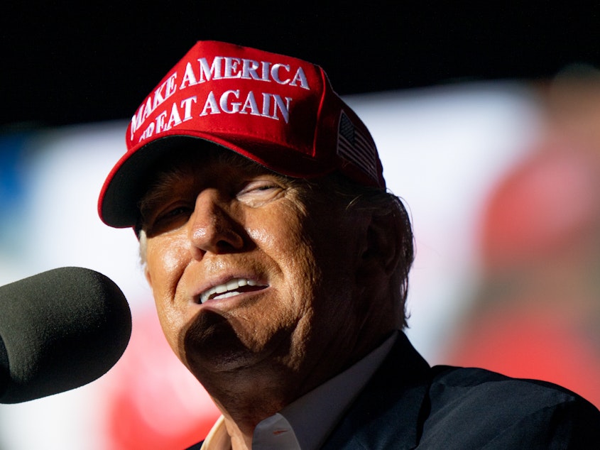 caption: Former President Donald Trump is pictured at a rally on Oct. 22 in Robstown, Texas. Trump was subpoenaed by the House select committee investigating the Jan. 6 Capitol riot in October, ordering him to turnover documents and testify before the panel.