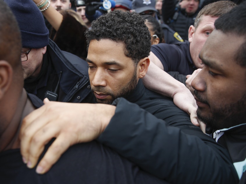 caption: <em>Empire</em> actor Jussie Smollett leaves Cook County jail following his release in Chicago last month.
