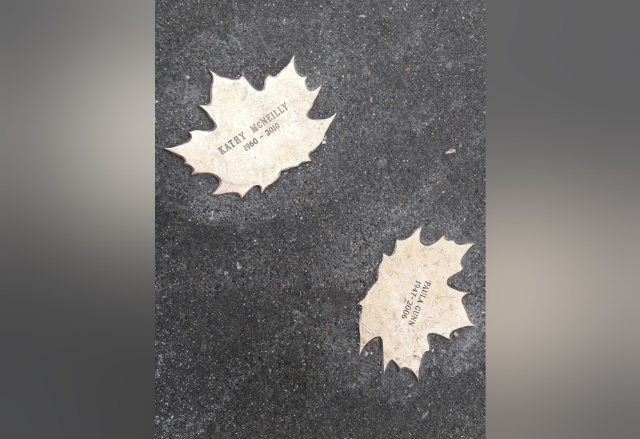 caption: The Homeless Remembrance Project has placed 256 bronze leaves across the city to remember homeless people who've died.