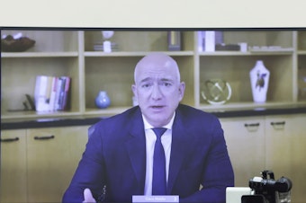 caption: Amazon CEO Jeff Bezos speaks via video conference during a House Judiciary subcommittee hearing on antitrust on Capitol Hill on July 29.
