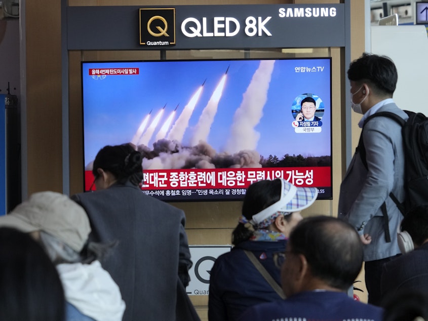 caption: A TV screen shows a file image of a North Korean missile launch during a news program at the Seoul Railway Station in South Korea on April 22, 2024. North Korea fired multiple suspected short-range ballistic missiles toward its eastern waters on Monday, South Korea's military said.