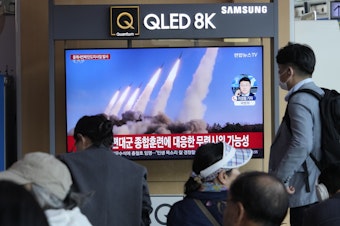 caption: A TV screen shows a file image of a North Korean missile launch during a news program at the Seoul Railway Station in South Korea on April 22, 2024. North Korea fired multiple suspected short-range ballistic missiles toward its eastern waters on Monday, South Korea's military said.