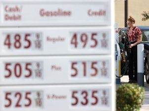 caption: A customer prepares to pump gas into her car at a Shell station on Nov. 17 in San Rafael, Calif. A surge in gas prices this year is leaving the Biden administration looking for options to do something about it. One that's getting recent attention is tapping the country's emergency oil stockpile.