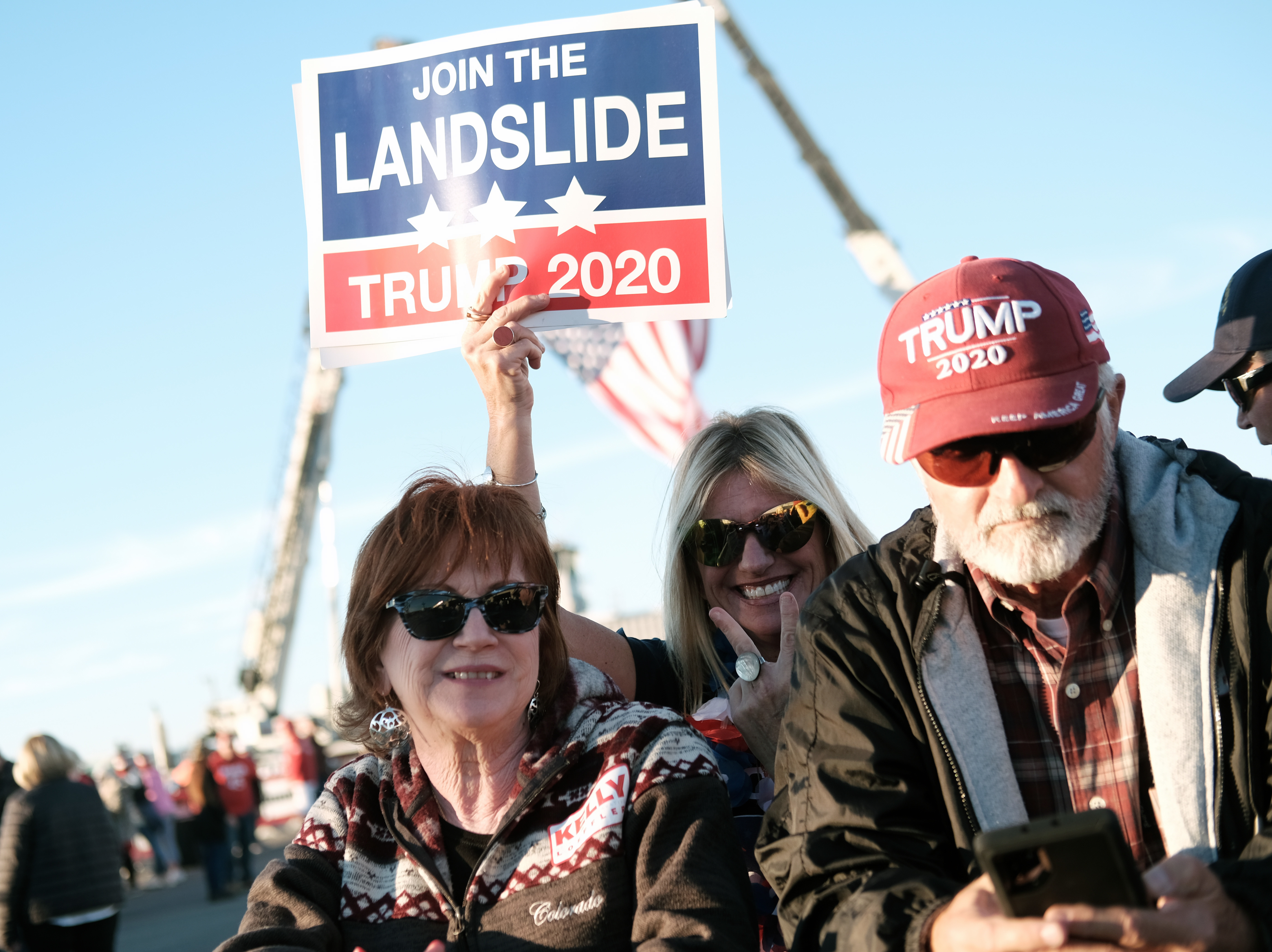 caption: Supporters arrive for a President Trump rally in Valdosta, Ga., last weekend. Fewer than half of Trump backers said they would get the COVID-19 vaccine in a new poll.