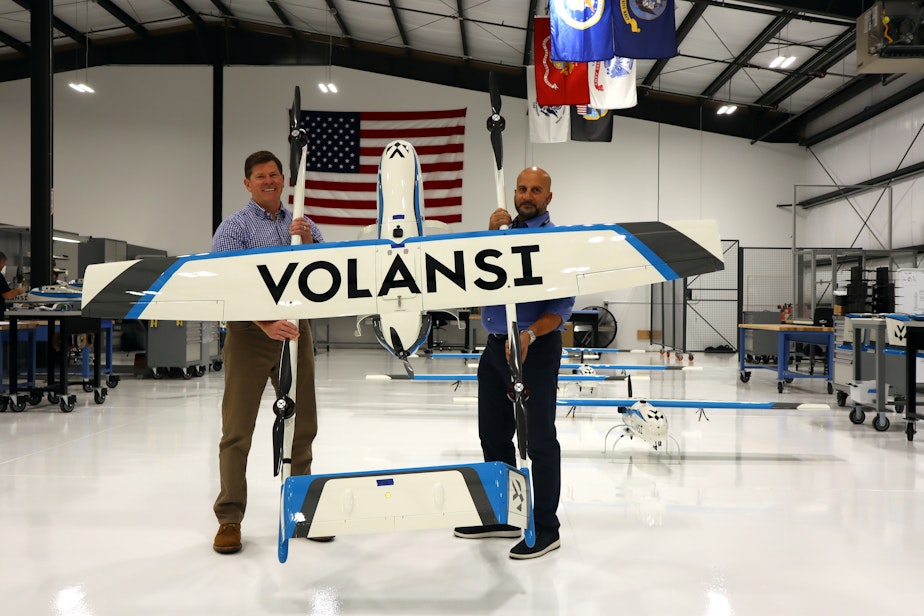 caption: Volansi executives Mike Jackson, left, and Ahmad Ziada at the drone delivery company's nearly one year old Bend, Oregon manufacturing facility.