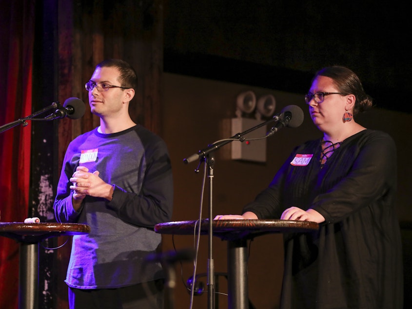 caption: Contestants compete in the Final Round on<em> Ask Me Another</em> at the Bell House in Brooklyn, New York.