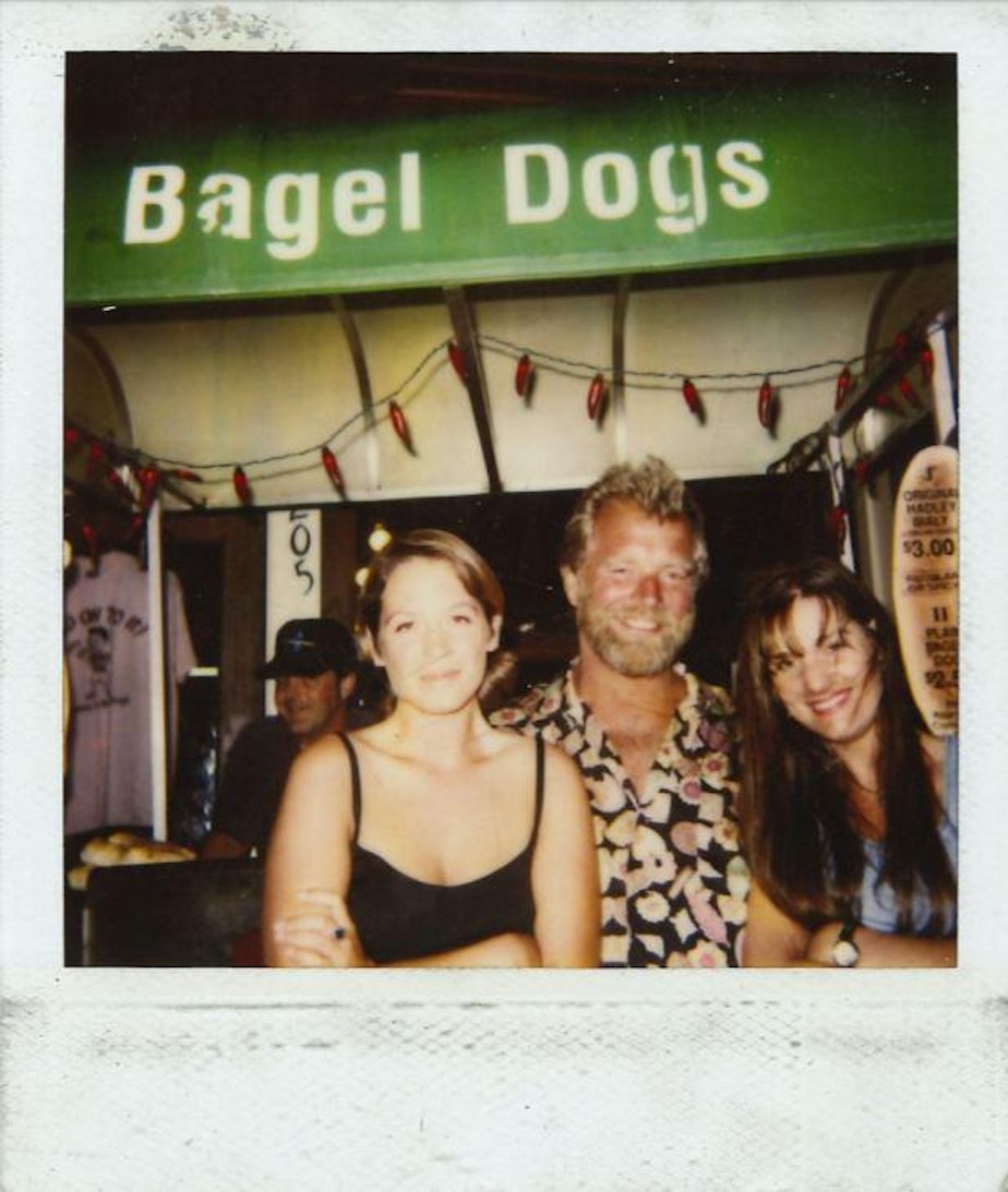 caption: Reppin OG Seattle, in front of the Bagel Dogs pushcart.