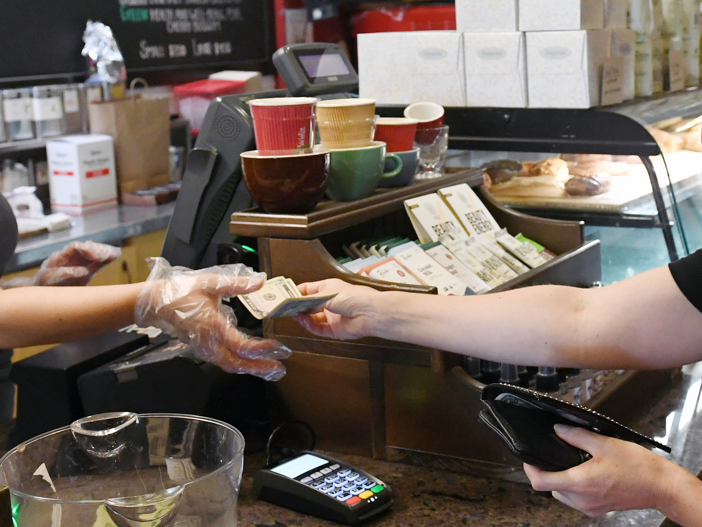 caption: Both Donald Trump and Kamala Harris are pushing to end taxes on tipping. But economists say any policy that bans taxes on tips could be abused if guardrails aren't put in place.