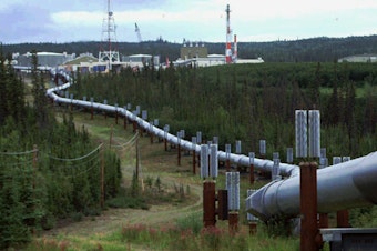 caption: The Biden administration is announcing new and proposed regulations to limit climate-warming methane emissions from oil and gas operations and pipelines. This undated file photo shows the Trans-Alaska pipeline and pump station north of Fairbanks.
