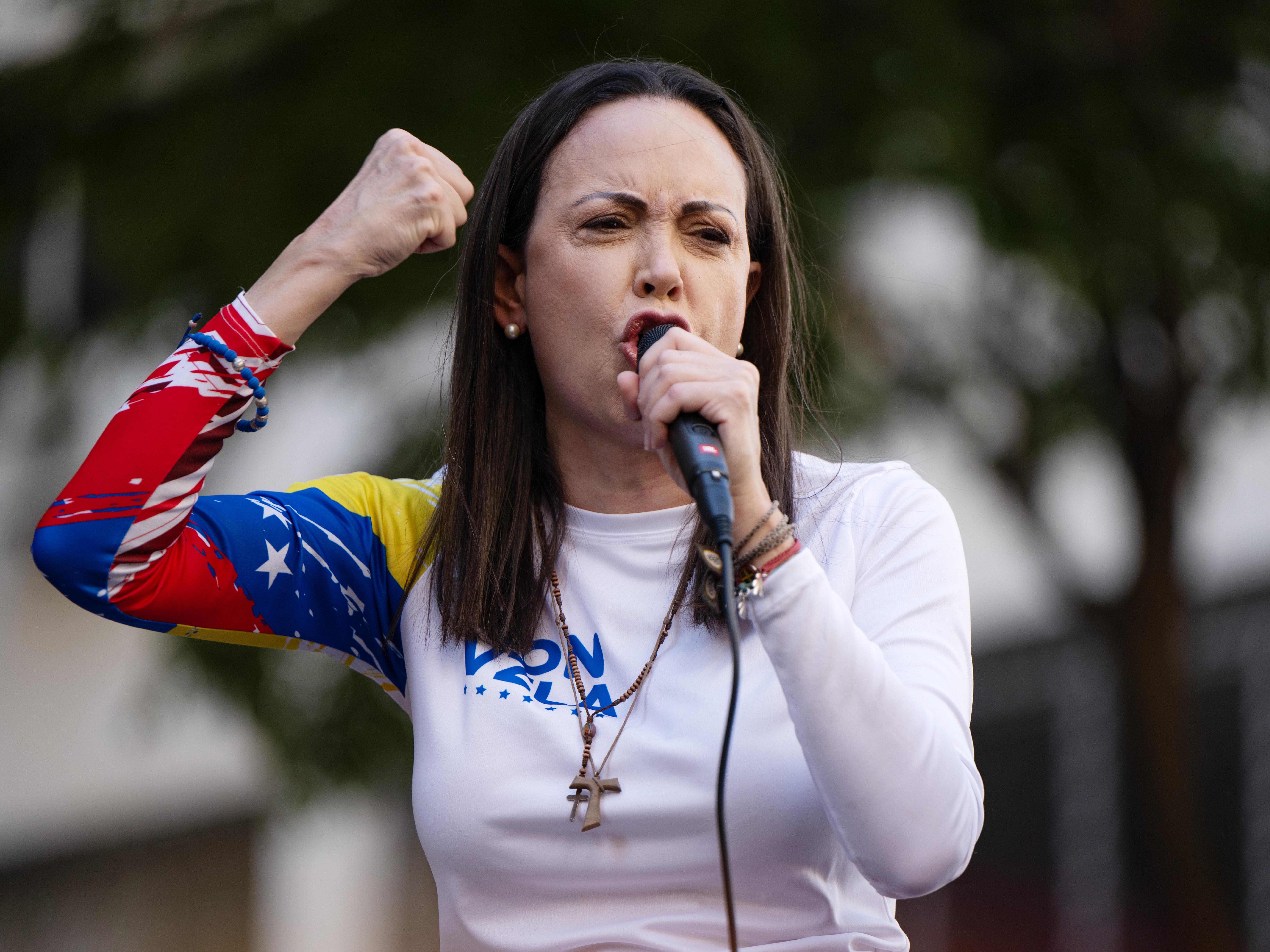 caption: Opposition leader Maria Corina Machado gives a speech during an Anti-government protest on Jan. 9, 2025 in Caracas, Venezuela.