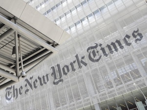 caption: The New York Times building in New York. <em>The New York Times</em> and <em>The Washington Post</em> both outlined new measures aimed at improving diversity in their newsrooms and coverage.