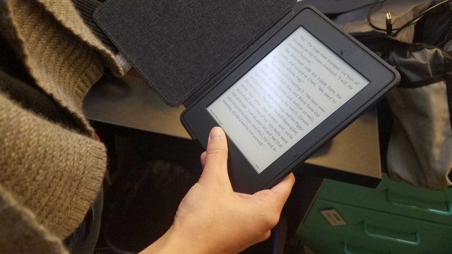 caption: An e-book reader. E-books are popular items in the King County Library System.