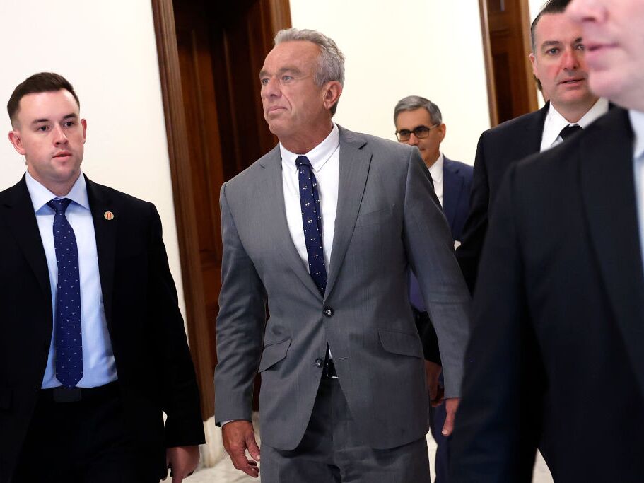 caption: Robert F. Kennedy Jr. arrives for a meeting with Senators in the Russell Senate Office Building on December 17, 2024 in Washington, DC.