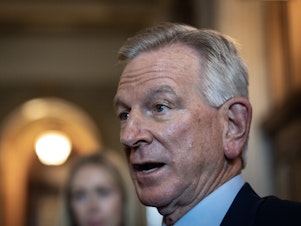 caption: Sen. Tommy Tuberville, R-Ala., speaks to reporters on his way to a closed-door lunch meeting with Senate Republicans at the U.S. Capitol on Nov. 7.