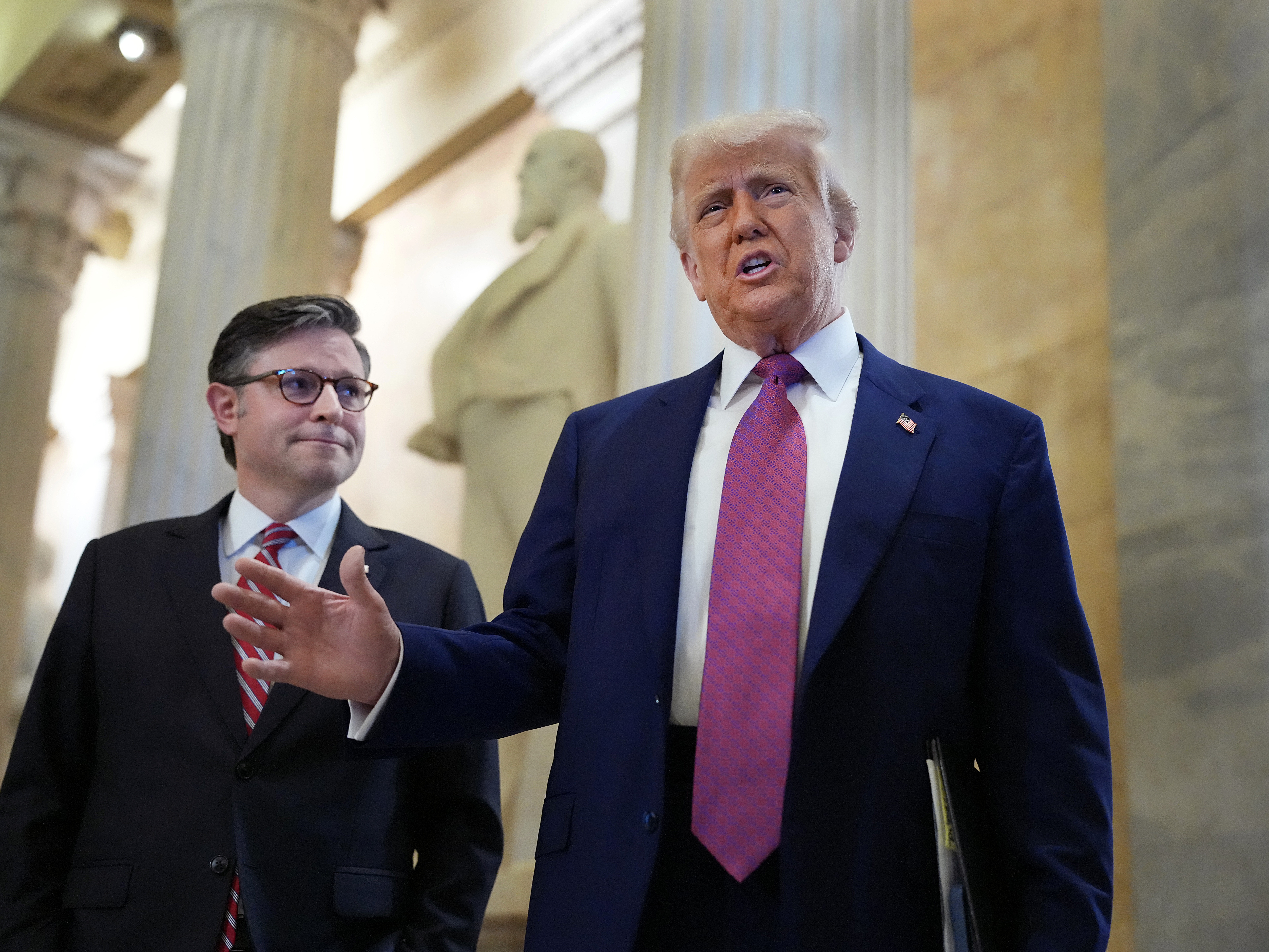 caption: President Trump speaks alongside Speaker of the House Mike Johnson, R-La., on Capitol Hill on Tuesday. Trump was on hand to meet with House Republicans and rally support for his legislative agenda.