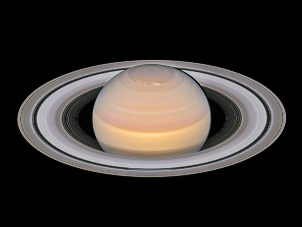 caption: The NASA/ESA Hubble Space Telescope observed Saturn on June 6.