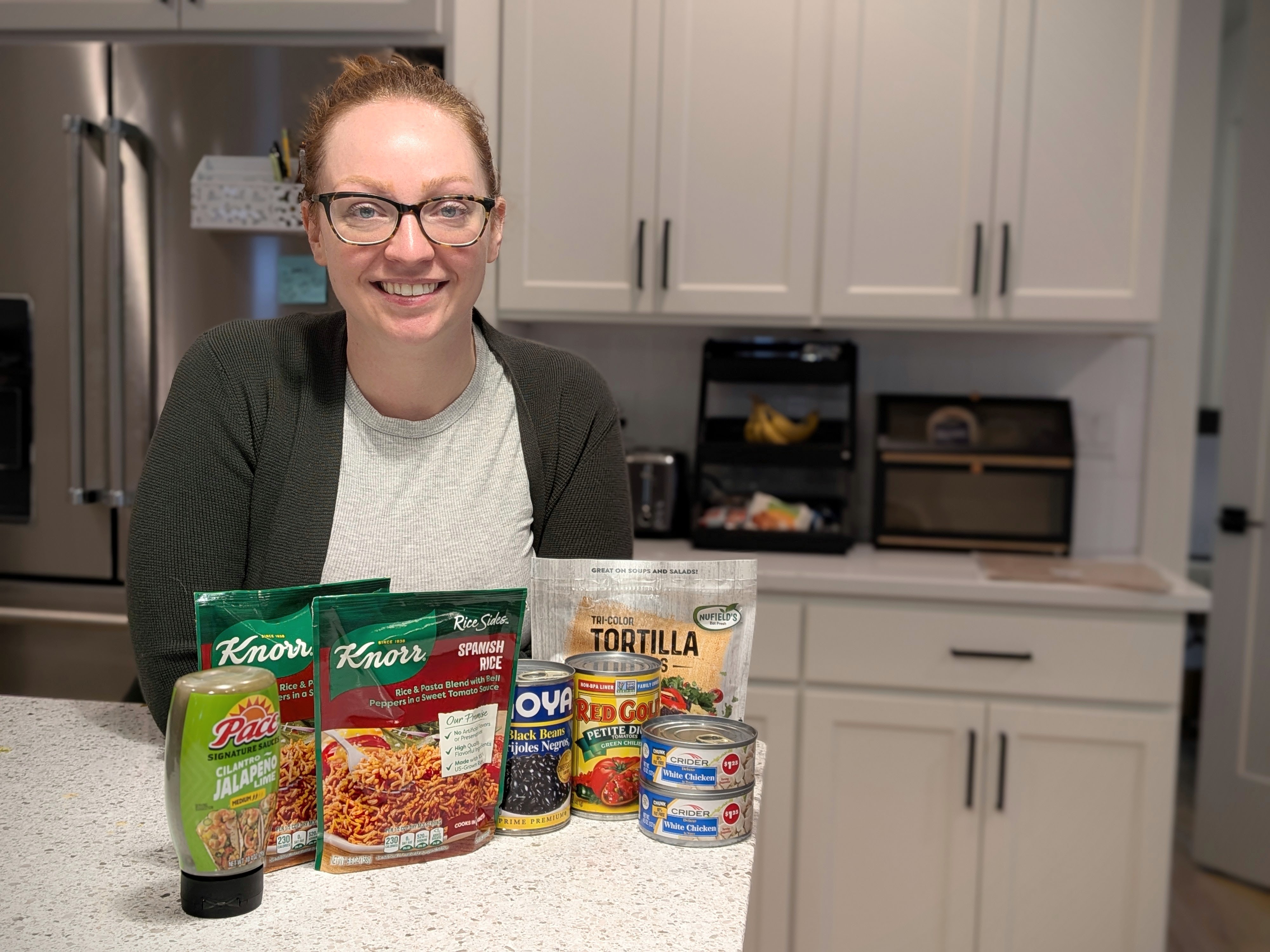 caption: On Rebecca Chobat's social media channel Dollar Tree Dinners, she shows how to put together a family-sized meal for $10. 