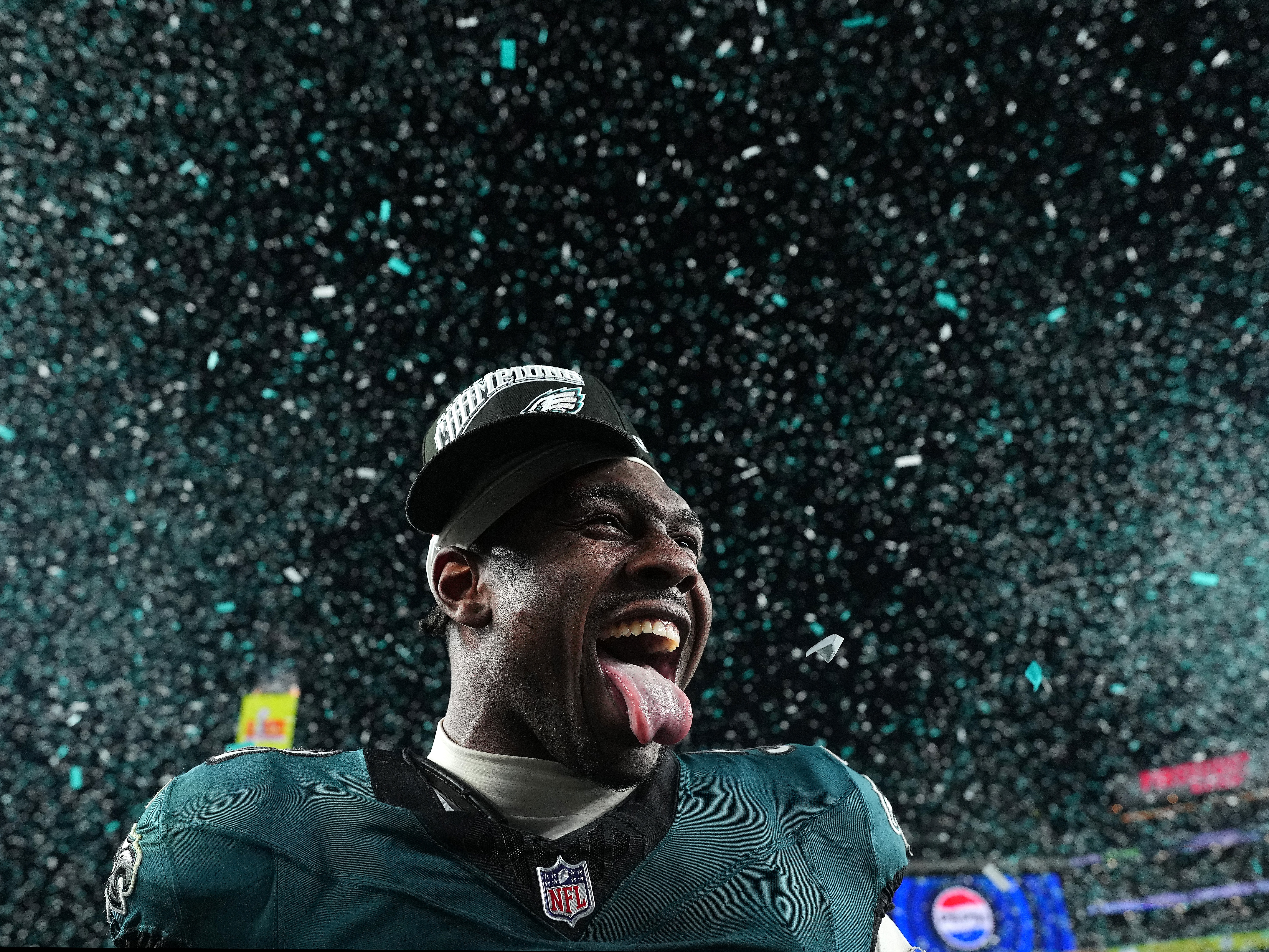 caption: PHILADELPHIA, PENNSYLVANIA - JANUARY 26: Jalyx Hunt #58 of the Philadelphia Eagles celebrates after their 55-23 win against to the Washington Commanders during the NFC Championship Game at Lincoln Financial Field on January 26, 2025 in Philadelphia, Pennsylvania.  (Photo by Mitchell Leff/Getty Images)