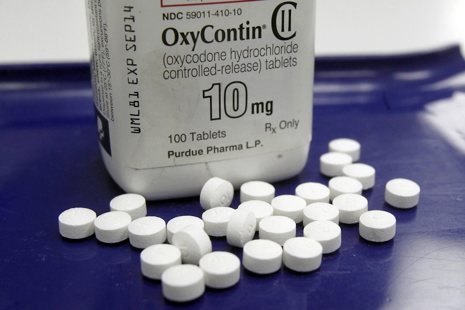 caption: This 2013 file photo shows OxyContin pills. (Toby Talbot/AP)