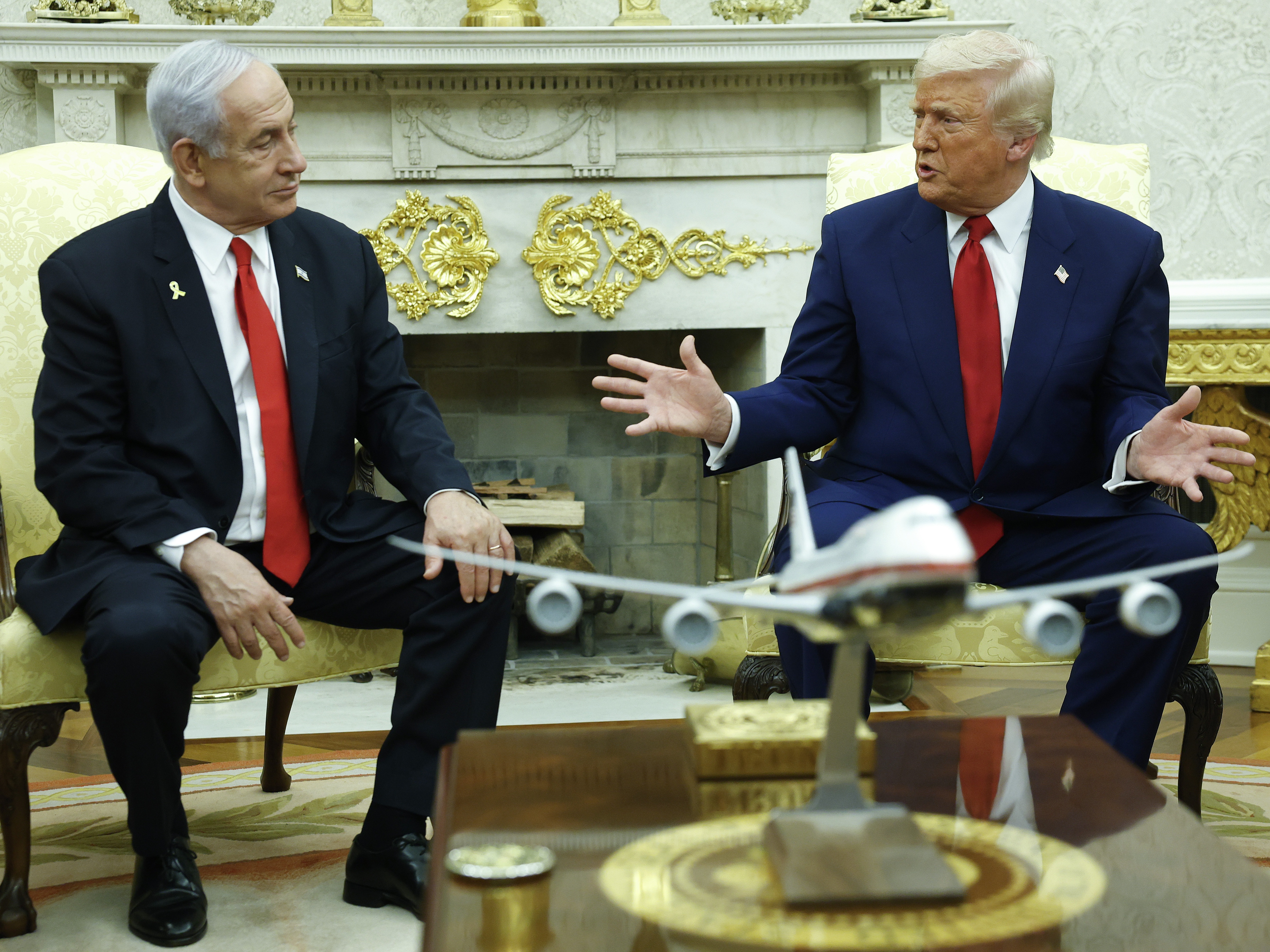 caption: President Donald Trump speaks alongside Israeli Prime Minister Benjamin Netanyahu during a meeting in the Oval Office of the White House on April 7, 2025, in Washington, D.C. Netanyahu and Trump are to meet again on Monday.