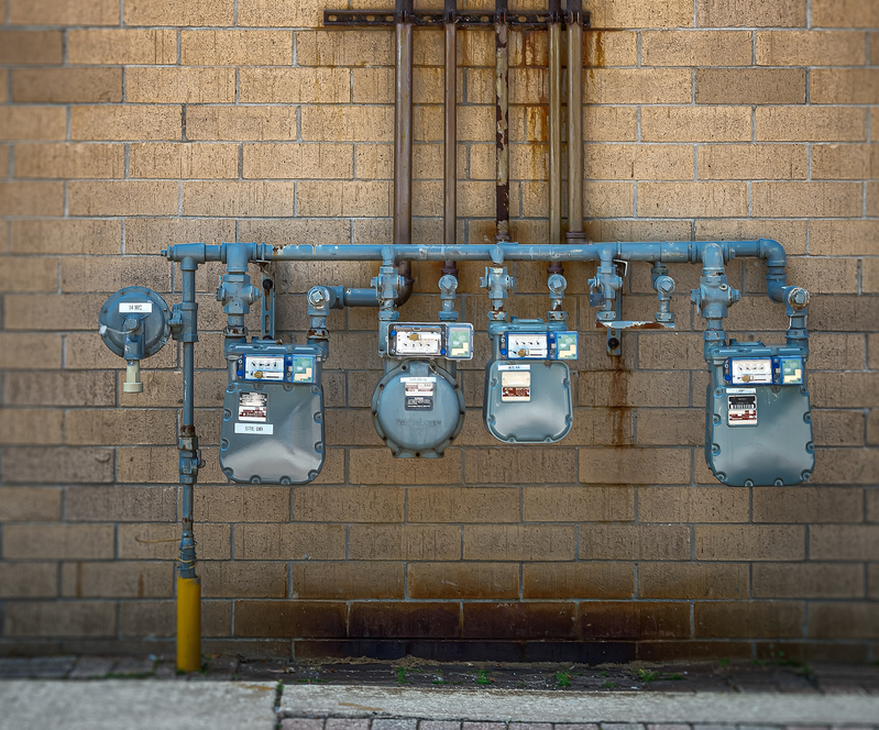 caption: New natural gas hookups to commercial buildings and homes are in the crosshairs of policymakers intent on reducing a growing source of carbon emissions.