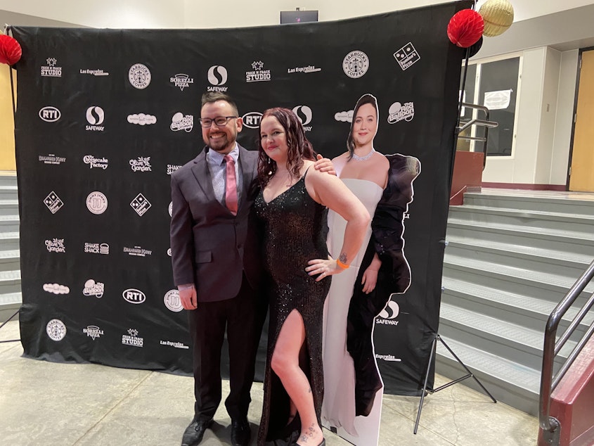 caption: Josh Ryder (left) poses for a photo at Mount Lake Terrace High School's Oscars watch party. Ryder was in drama club with Lily Gladstone, who attended the school and was nominated for Best Actress. 