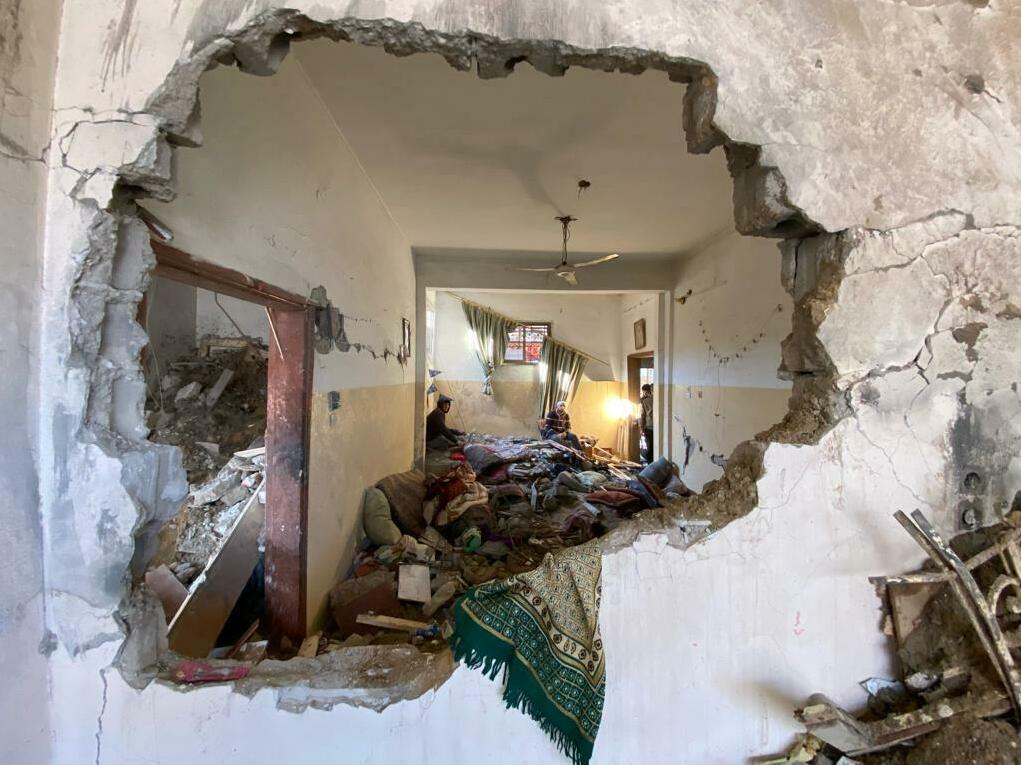 caption: More than 20,000 people have now been killed in Gaza since the start of the war, according to Gaza's Ministry of Health. Above, a home in Rafah is shown in the aftermath of an Israeli airstrike.