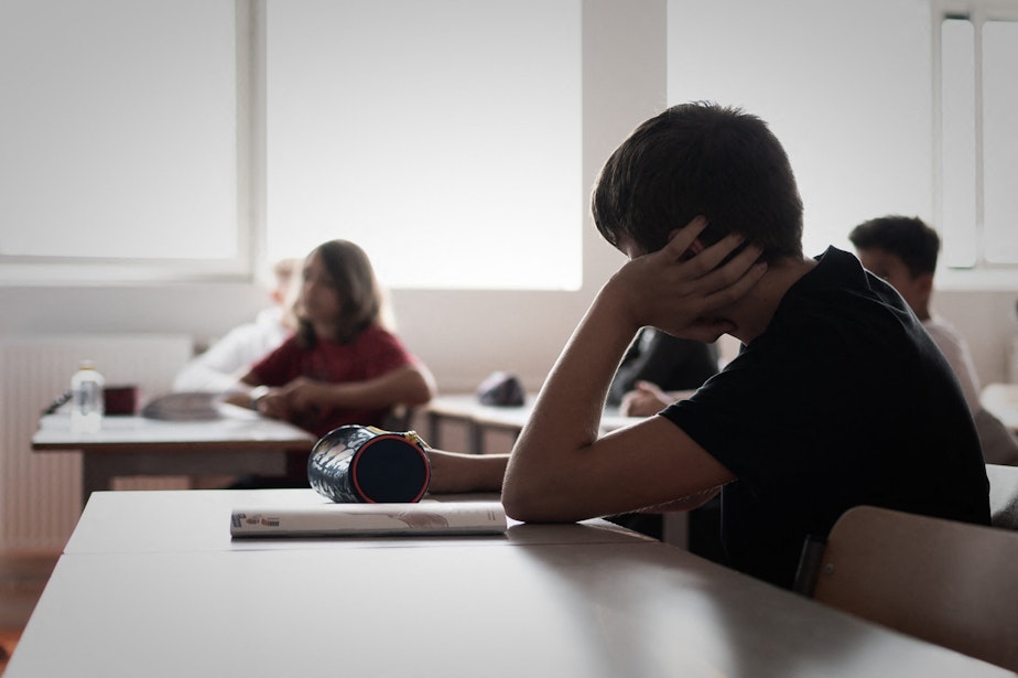 caption: Students with disabilities attend a class at a middle school. (Photo by Philippe Lopez/AFP via Getty Images)