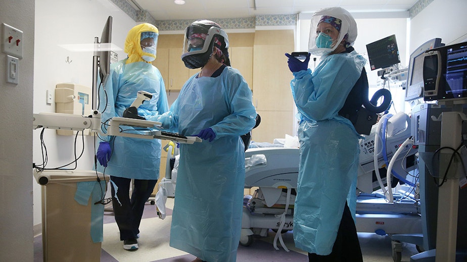 caption: Clinicians care for a COVID-19 patient in the Intensive Care Unit (ICU) at El Centro Regional Medical Center in hard-hit Imperial County on July 21, 2020 in El Centro, California. (Mario Tama/Getty Images)