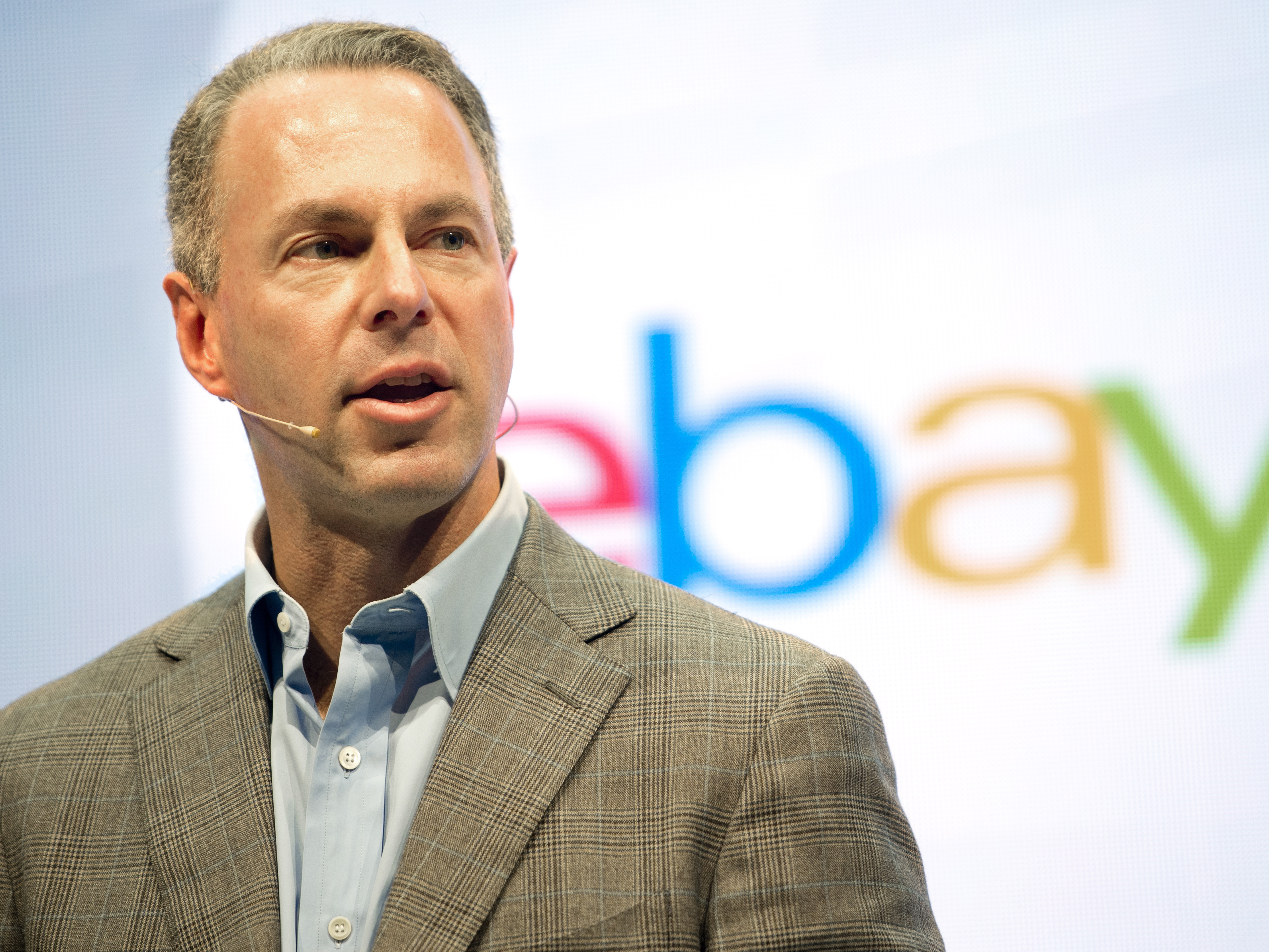 caption: Chief executive Devin Wenig is leaving eBay amid the online shopping company's corporate overhaul.